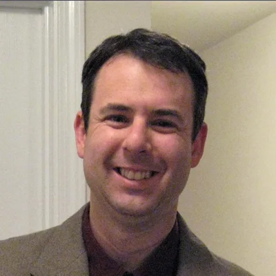 A headshot photo of Dr. Benjamin Bittner, an optometrist at Human Eyes Vision Center